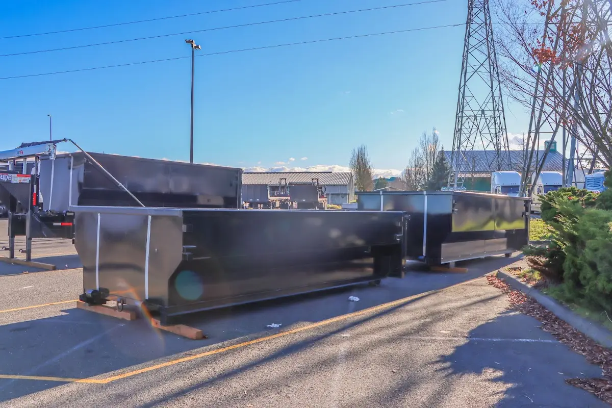 Roll-off dumpster ready for waste disposal at job site for Construction Dumpster Rental in Parkway